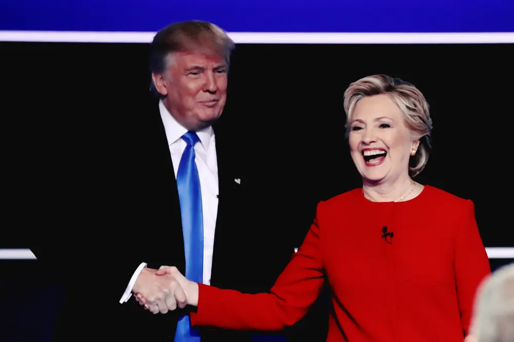 Hillary Clinton shakes hands with Donald Trump after the presidential debate on Monday night. | Drew Angerer/Getty Images